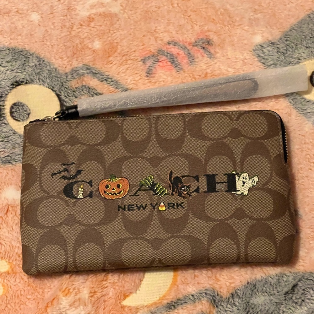 Coach Large Corner Zip Wristlet In Signature
Canvas With Halloween Design 🎃👻